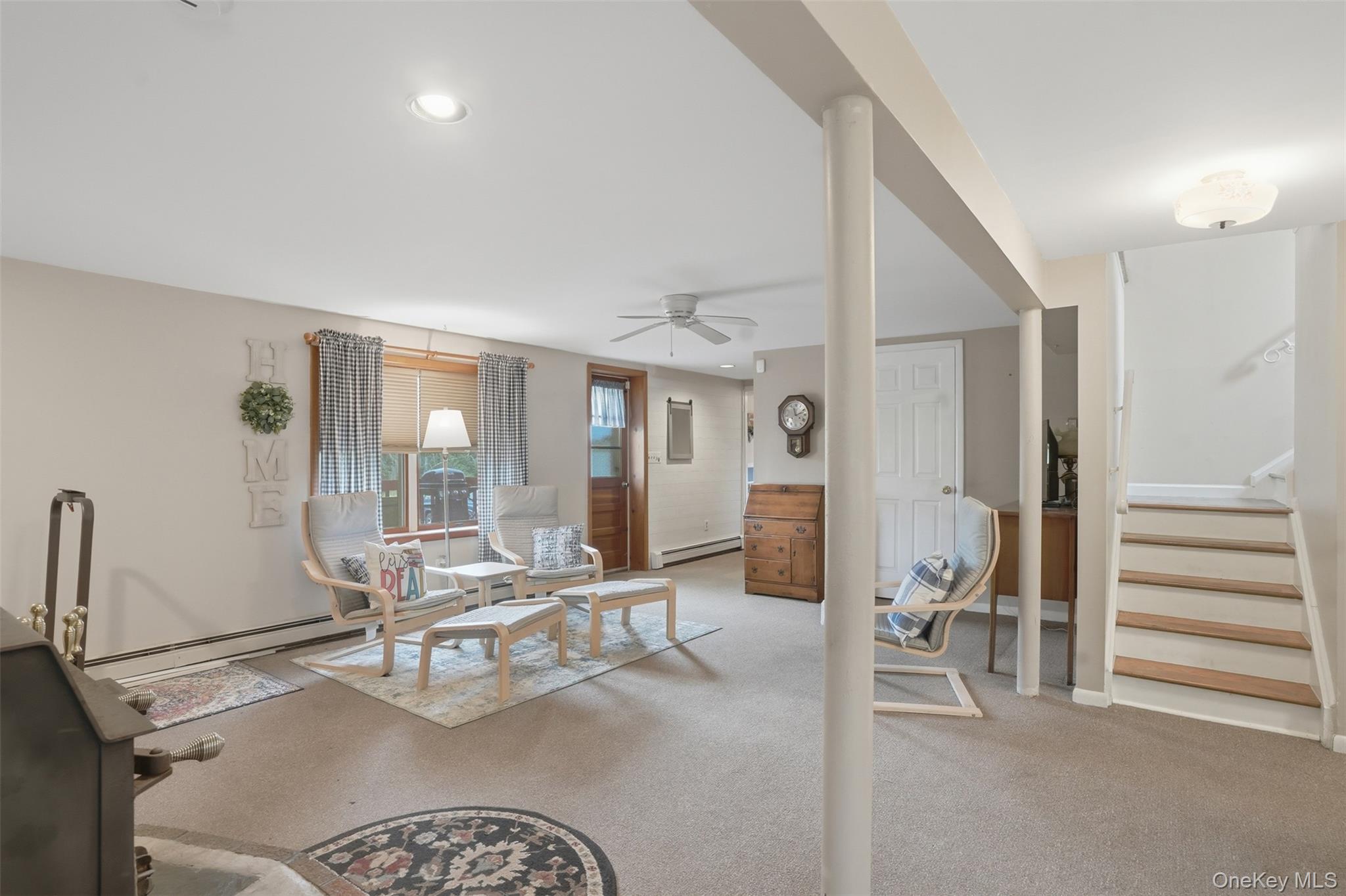 23 Old Cross Road Warwick, NY 10990 - Photo 22 of 34 The lower level boasts a family room space offering flexibility of use. Home office? Home theatre? Home gym? Playroom?