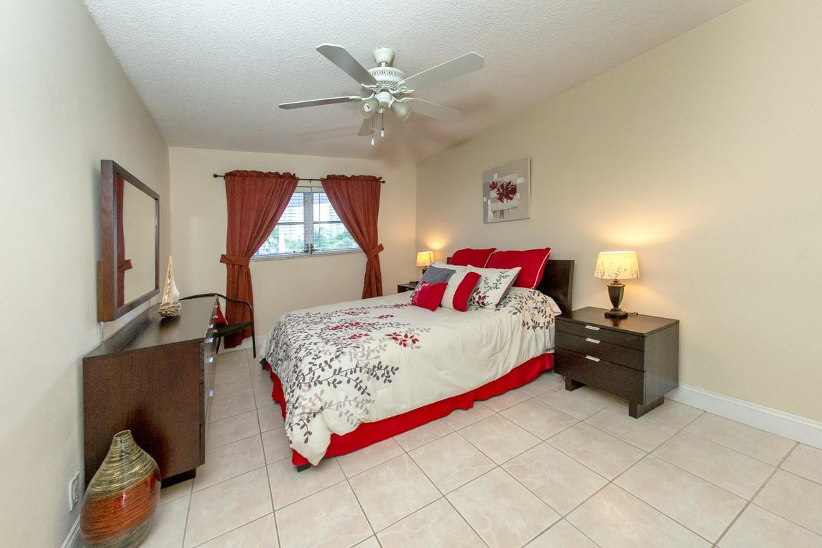 801 North Riverside Drive, Unit 5C Pompano Beach, FL 33062 - Photo 19 of 32 Spacious guest bedroom