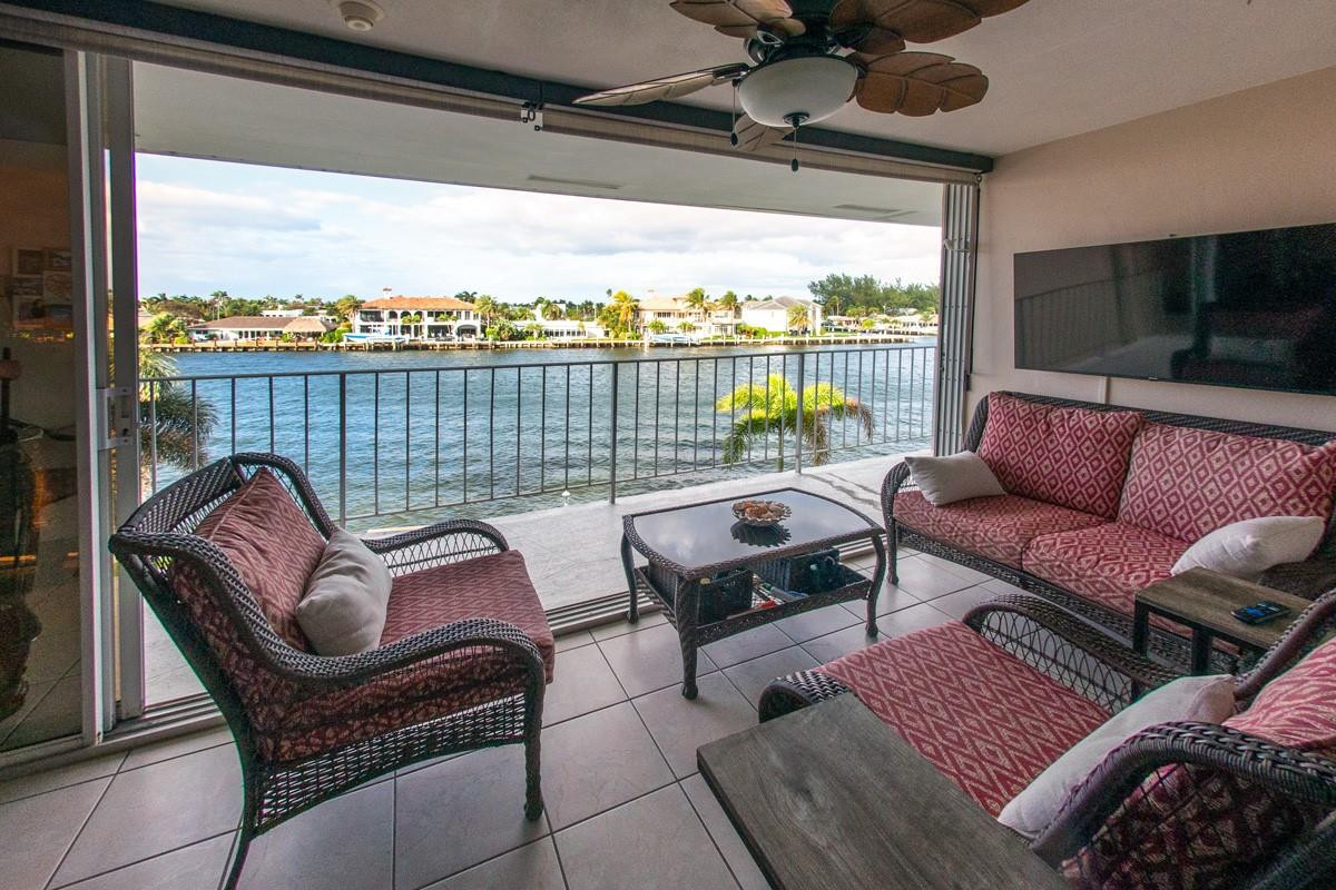 801 North Riverside Drive, Unit 5C Pompano Beach, FL 33062 - Photo 2 of 32 Furnished patio- use rain or shine!