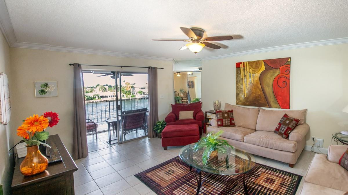 801 North Riverside Drive, Unit 5C Pompano Beach, FL 33062 - Photo 10 of 32 Spacious living room with water view