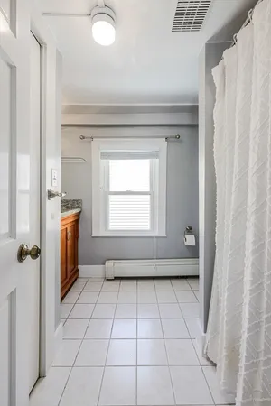 a view of a utility room with a window
