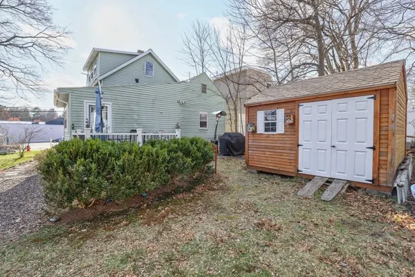 a house view with a backyard space