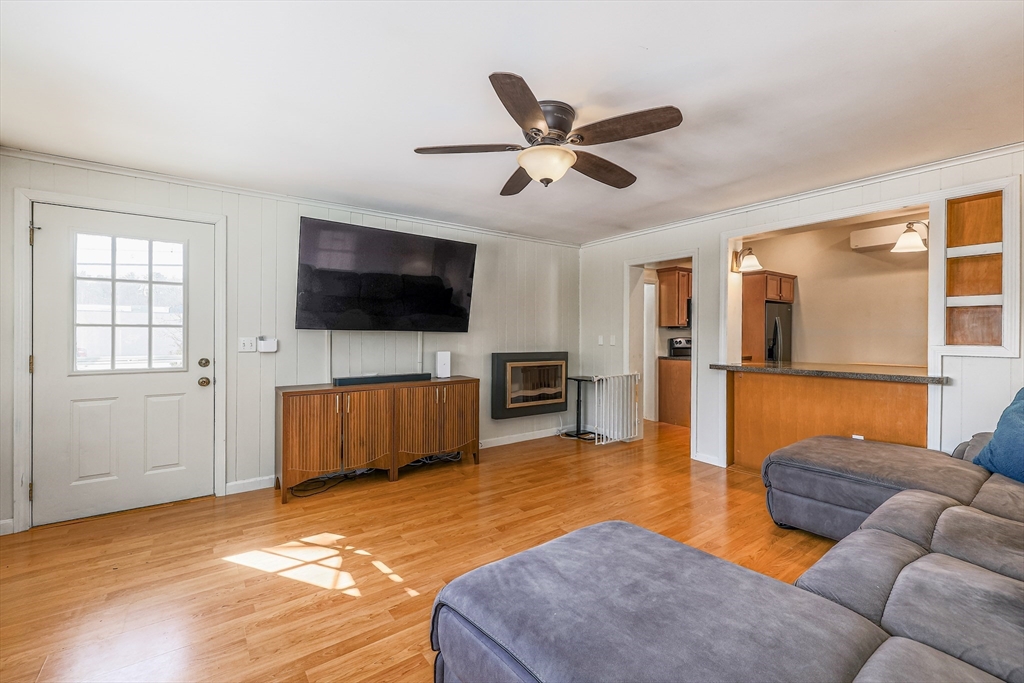 10 Metropolitan Avenue Ashland, MA 01721 - Photo 4 of 34 a living room with furniture and a flat screen tv