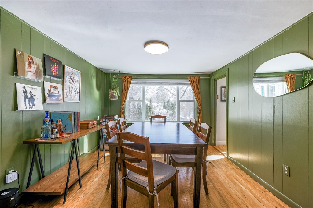 10 Metropolitan Avenue Ashland, MA 01721 - Photo 9 of 34 a view of a dining room with furniture and a large window