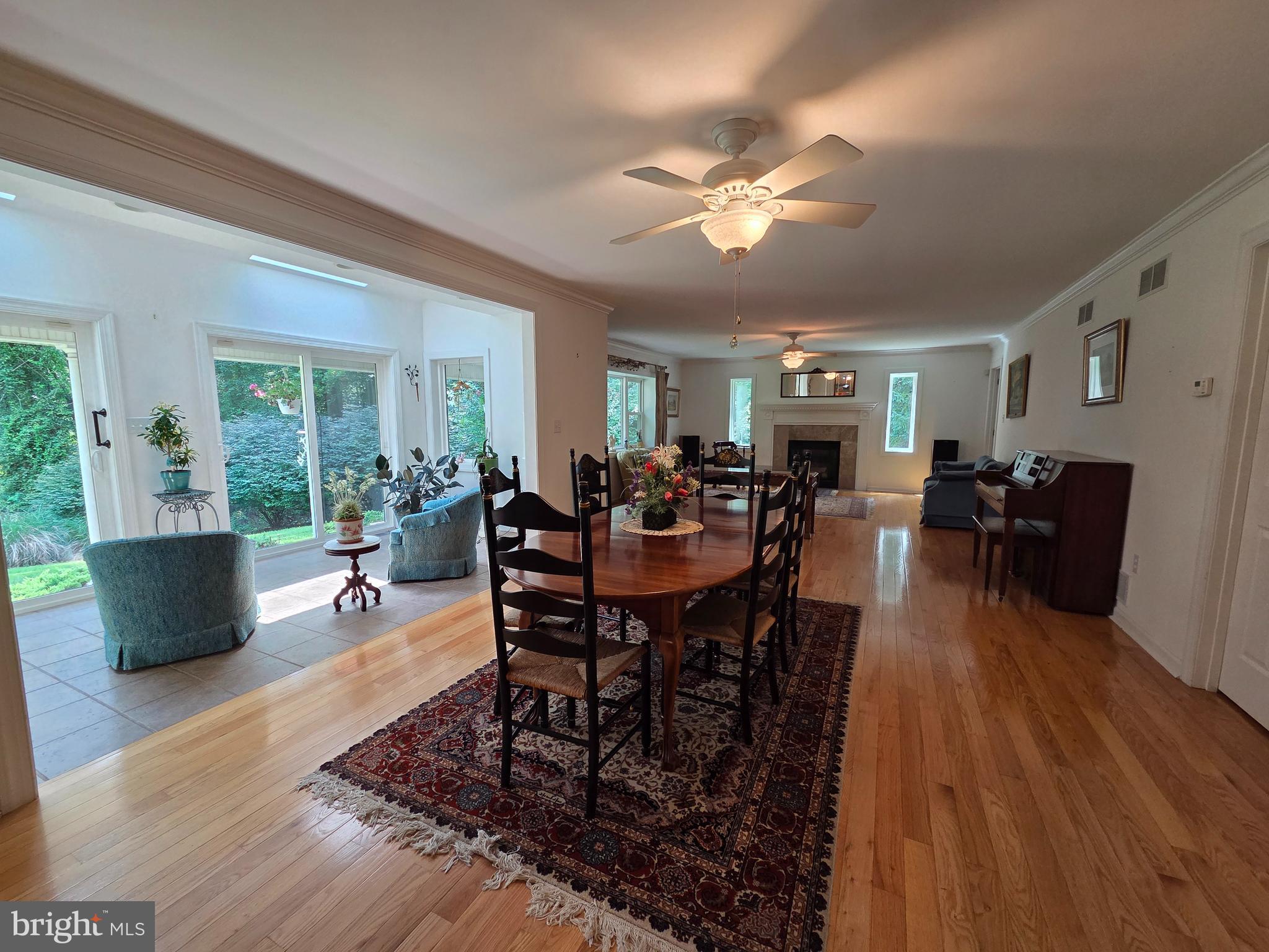 178 Shed Road Douglassville, PA 19518 - Photo 19 of 58 a view of a dining room with furniture window and wooden floor