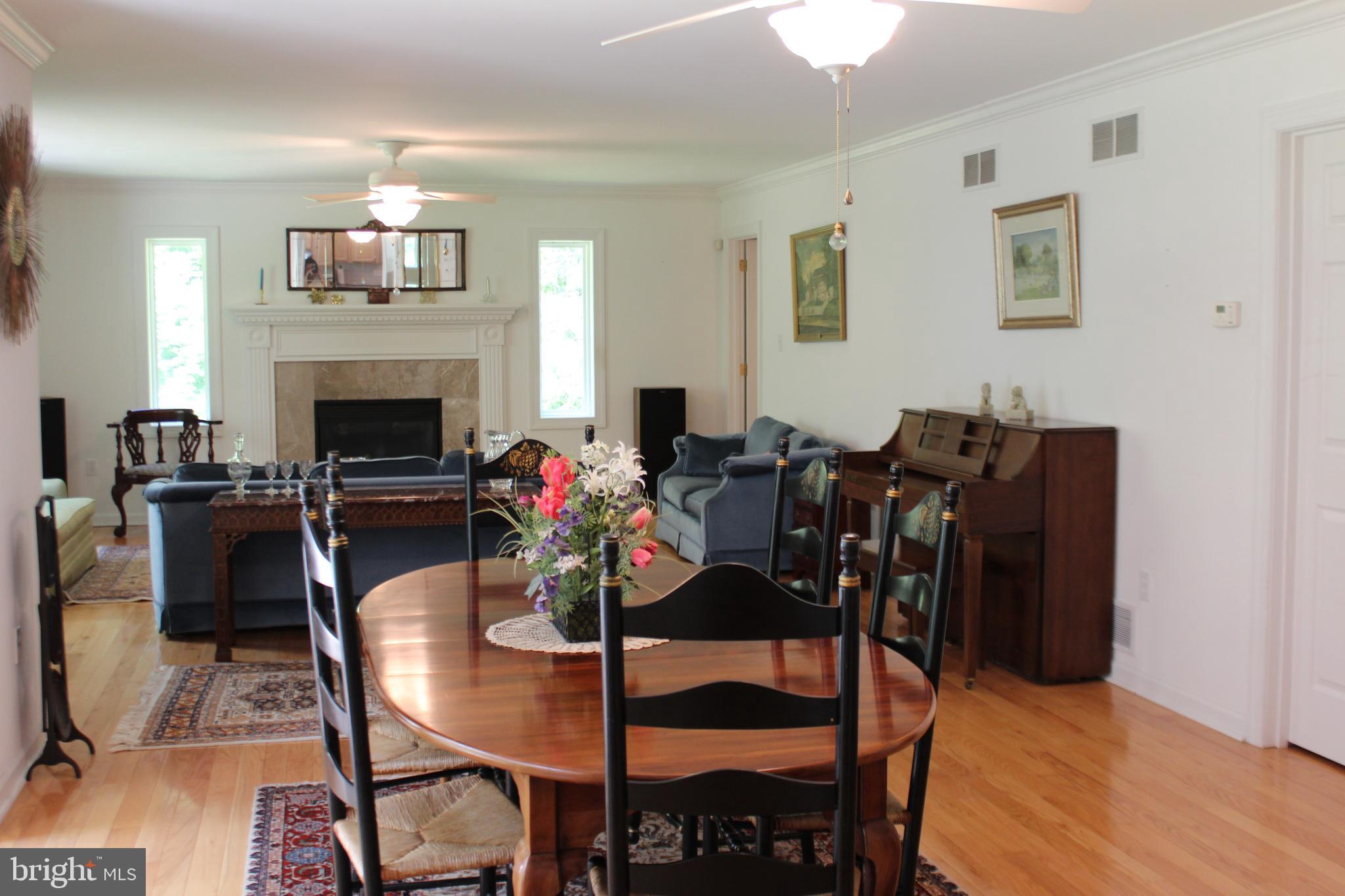 178 Shed Road Douglassville, PA 19518 - Photo 20 of 58 a view of a dining room with furniture and wooden floor