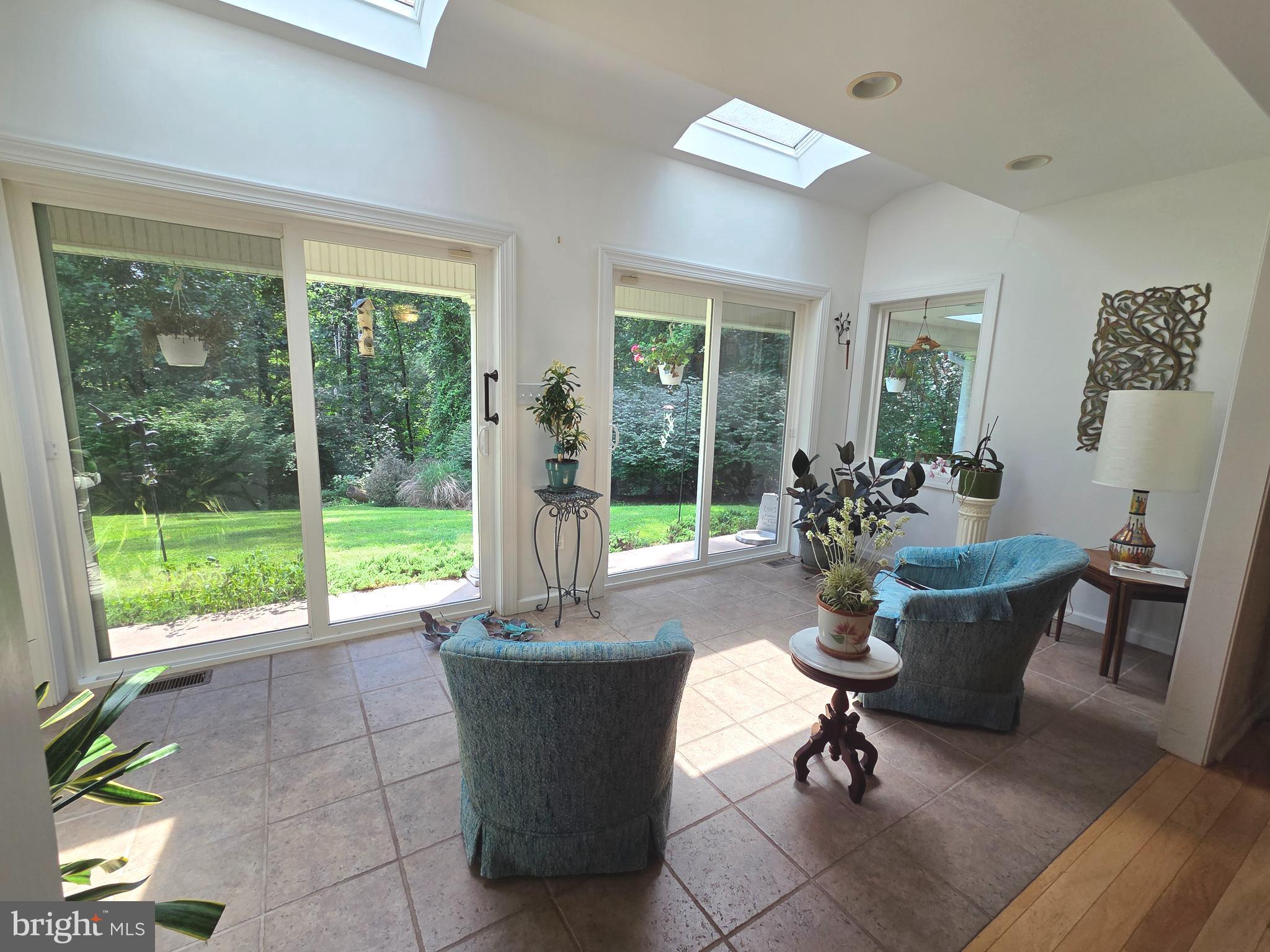 178 Shed Road Douglassville, PA 19518 - Photo 22 of 58 a living room filled with furniture and a large window