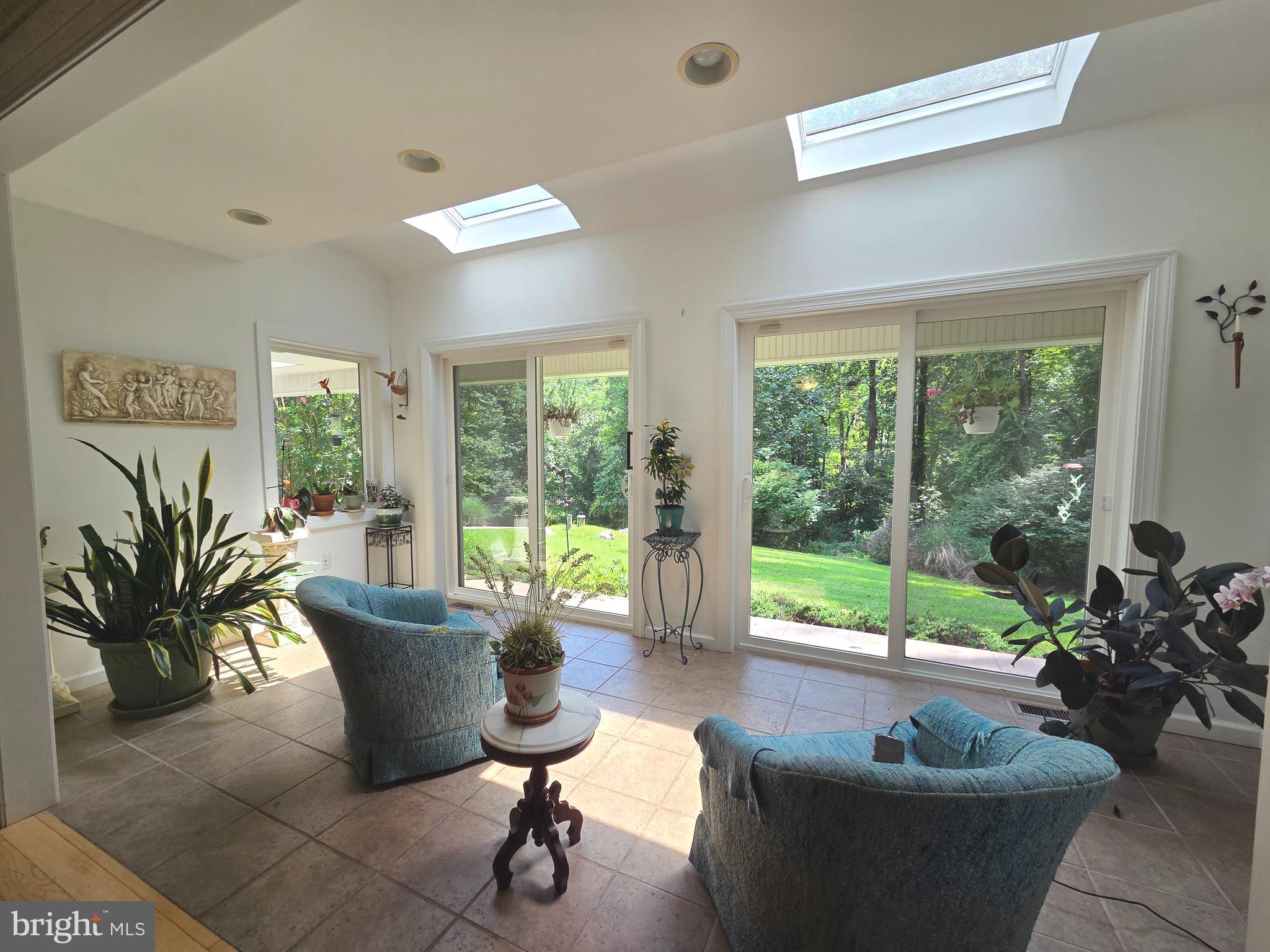 178 Shed Road Douglassville, PA 19518 - Photo 23 of 58 a living room with furniture and a potted plant
