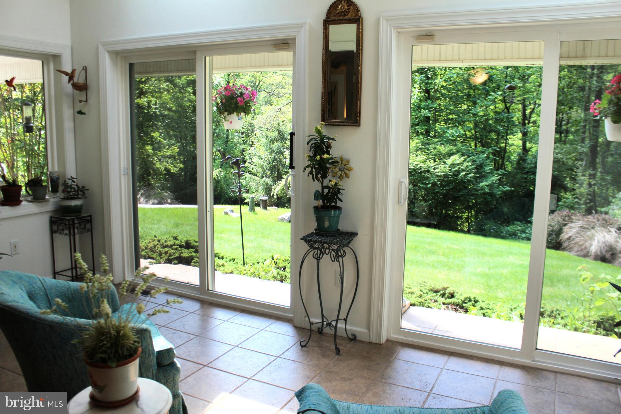 178 Shed Road Douglassville, PA 19518 - Photo 25 of 58 a living room filled with furniture and a large window