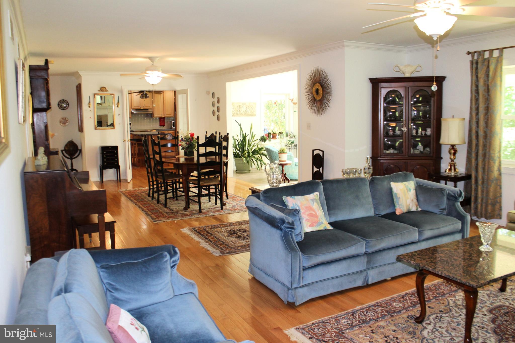 178 Shed Road Douglassville, PA 19518 - Photo 27 of 58 a living room with furniture and wooden floor