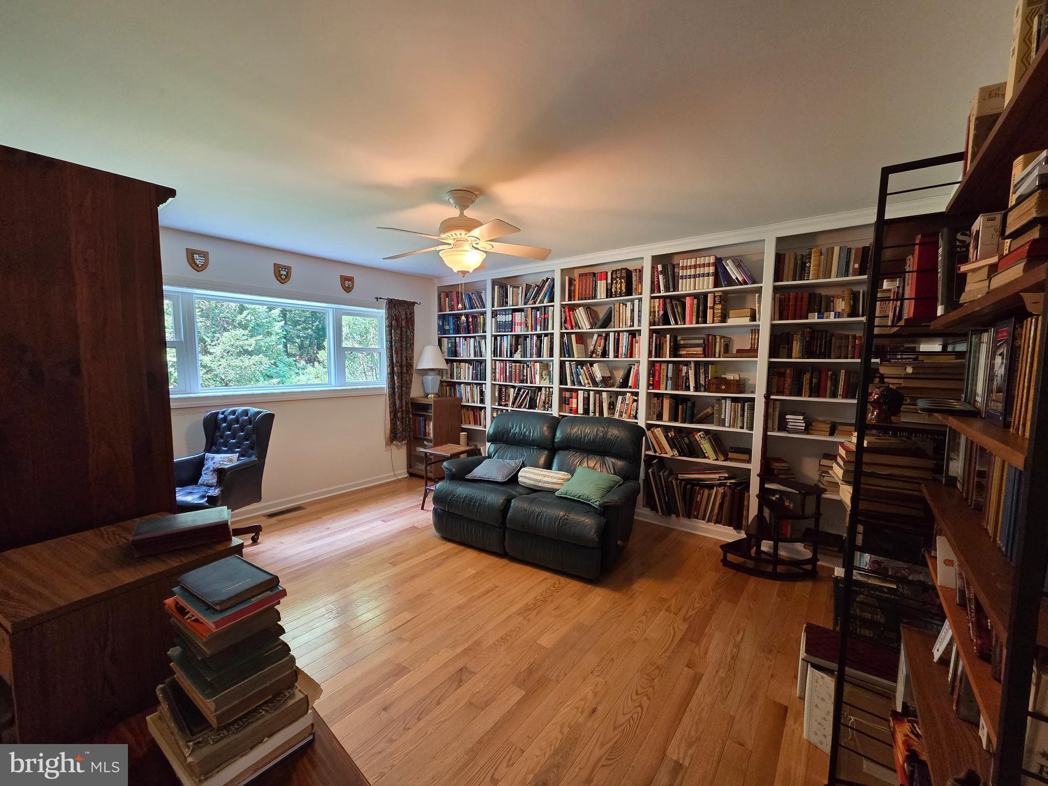 178 Shed Road Douglassville, PA 19518 - Photo 31 of 58 a living room with furniture a rug and a window