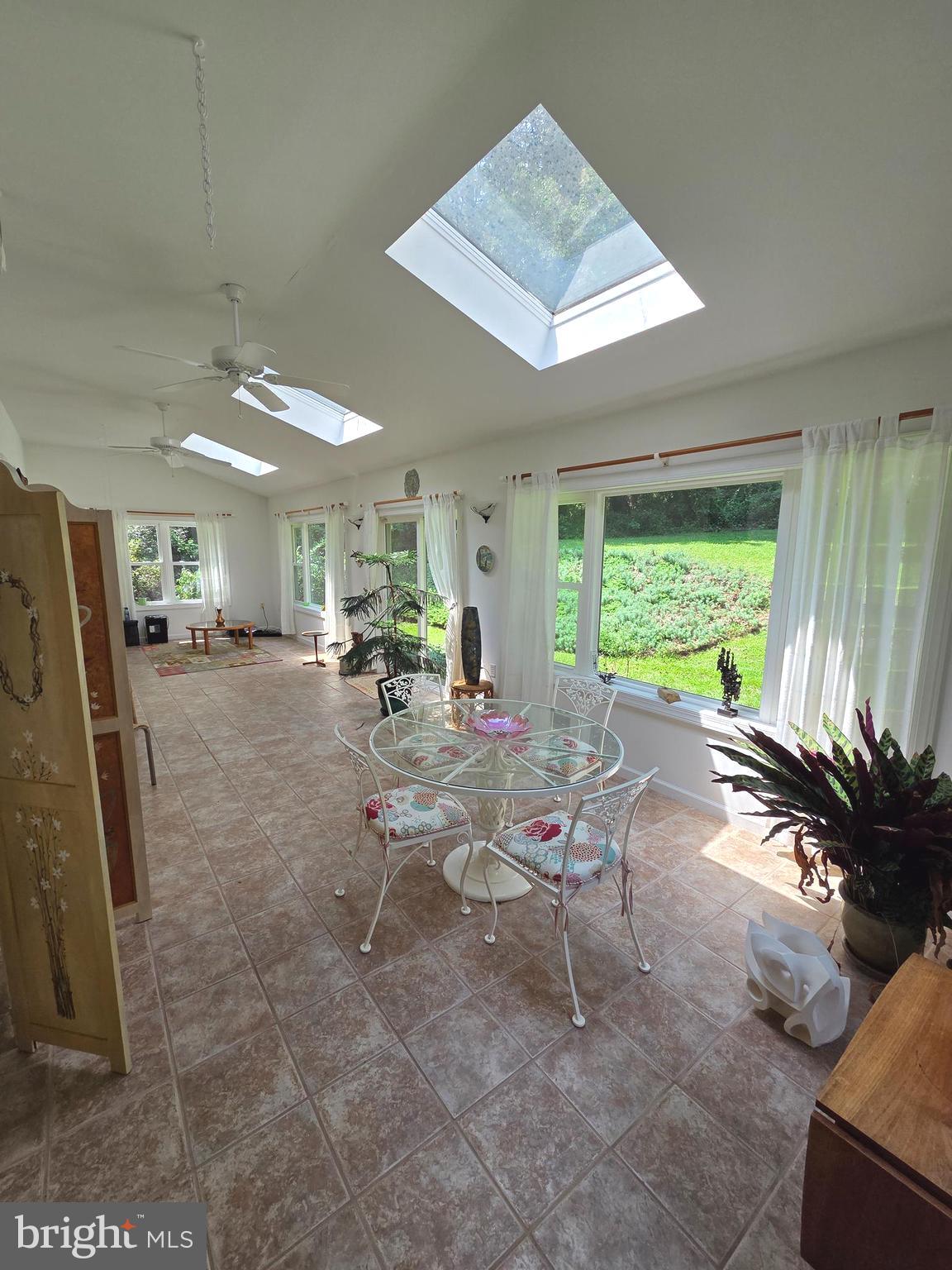 178 Shed Road Douglassville, PA 19518 - Photo 36 of 58 a living room with furniture and a large window