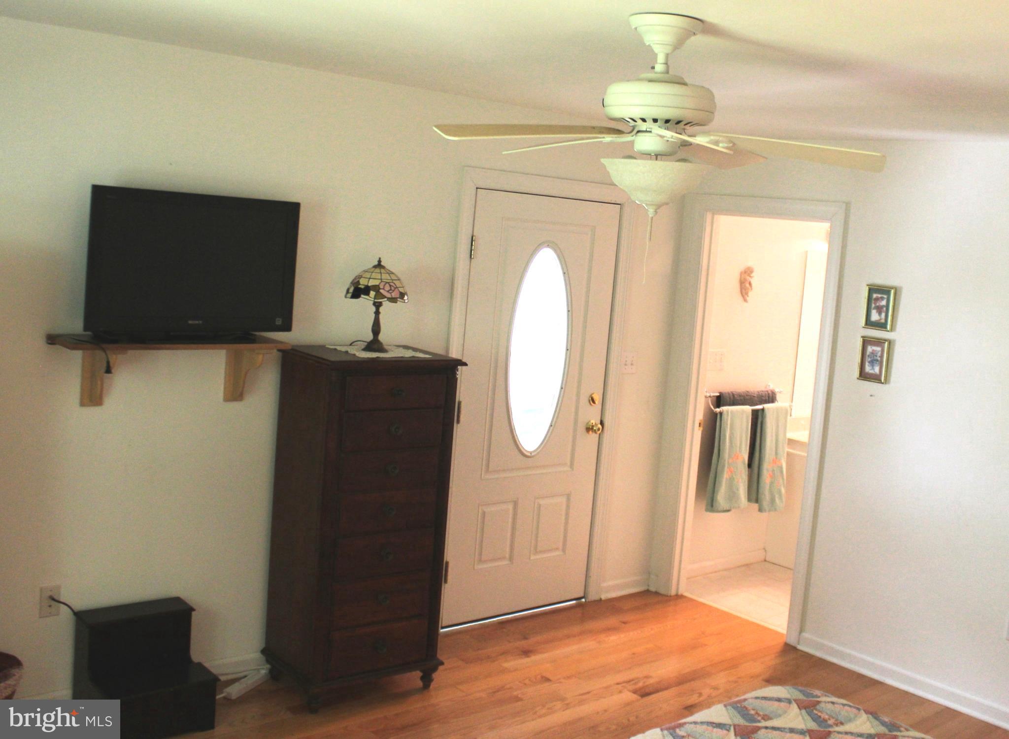 178 Shed Road Douglassville, PA 19518 - Photo 43 of 58 a view of a hallway with wooden floor and cabinet