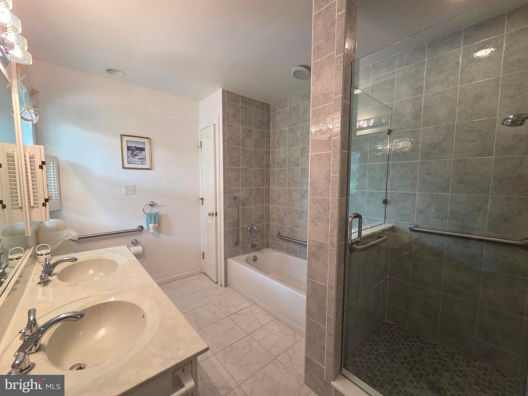 178 Shed Road Douglassville, PA 19518 - Photo 44 of 58 a bathroom with a sink and shower