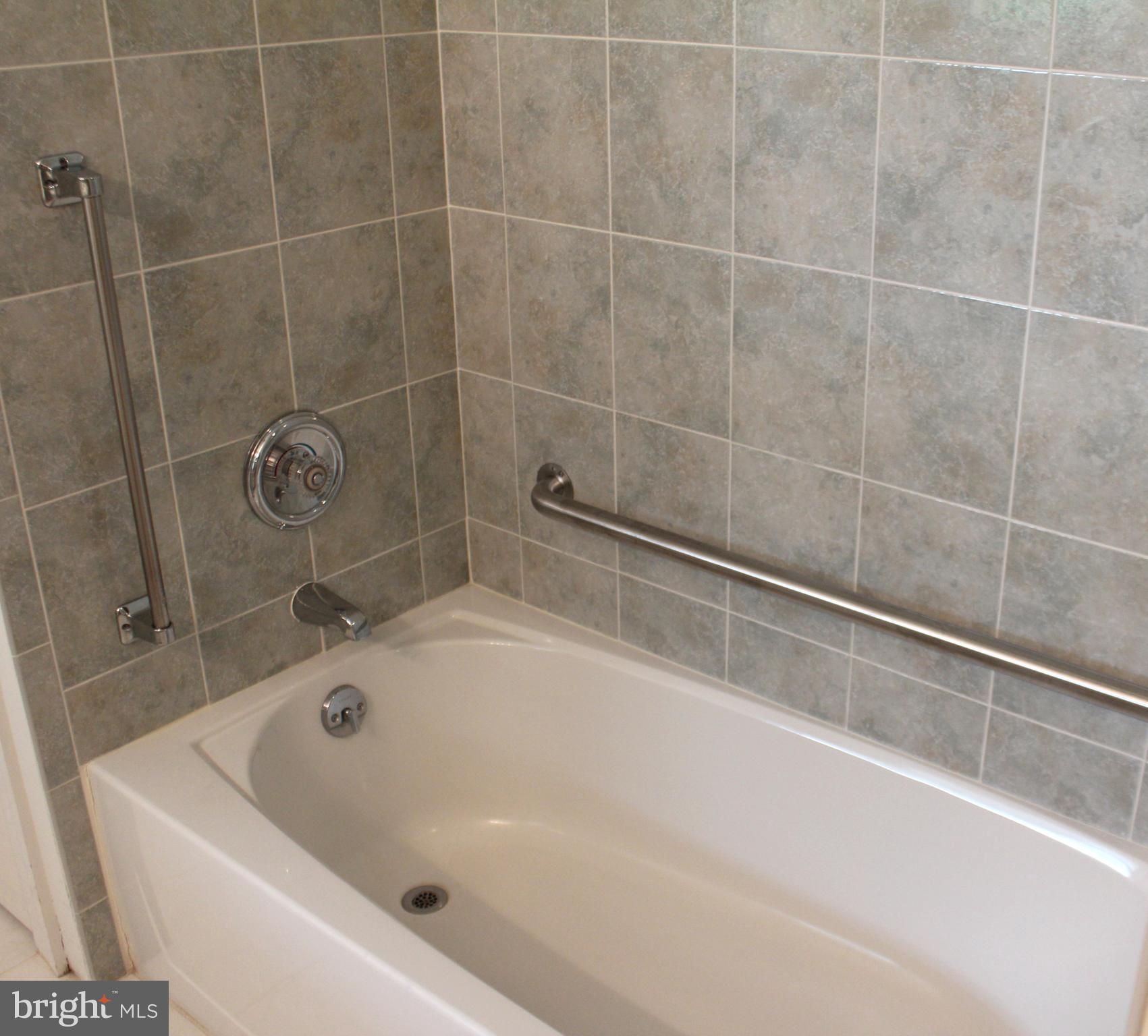 178 Shed Road Douglassville, PA 19518 - Photo 46 of 58 a bathroom with a bathtub