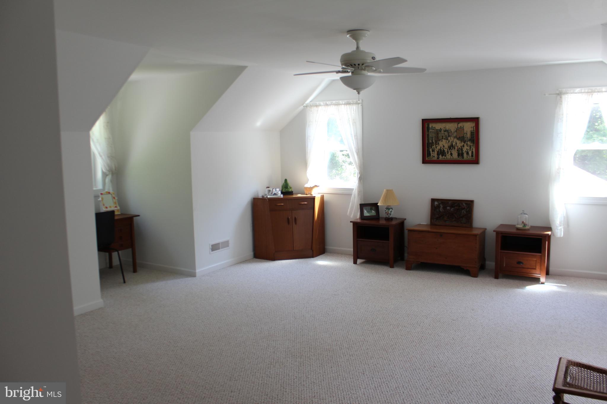 178 Shed Road Douglassville, PA 19518 - Photo 53 of 58 a living room with furniture and a flat screen tv