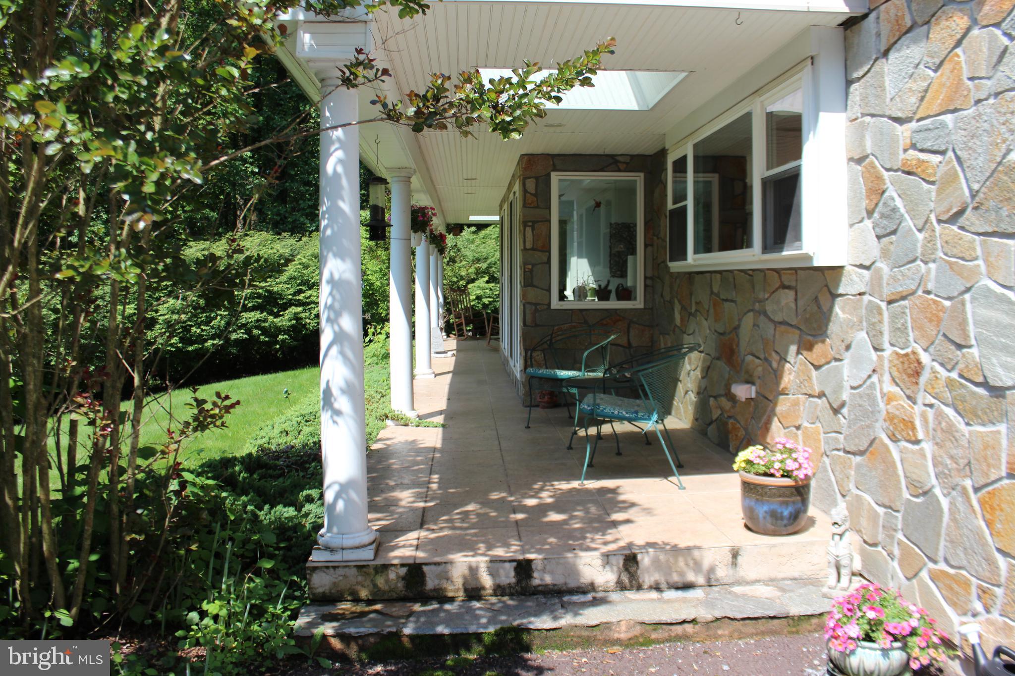 178 Shed Road Douglassville, PA 19518 - Photo 6 of 58 a front view of a house with patio