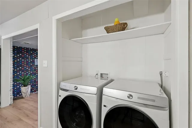 a utility room with dryer and washer