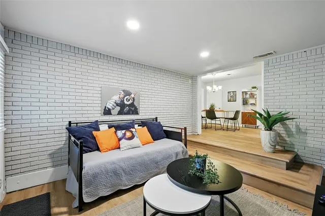 a living room with furniture and a rug