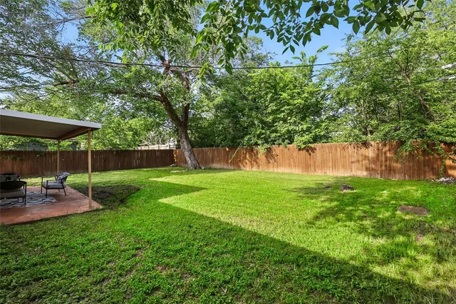 a view of a yard with a slide