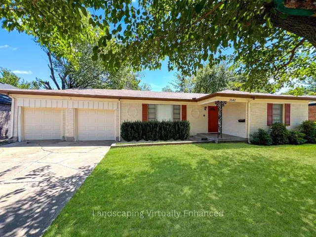 a house view with a garden space