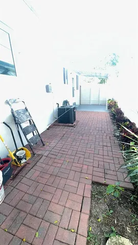 a view of a backyard with garden