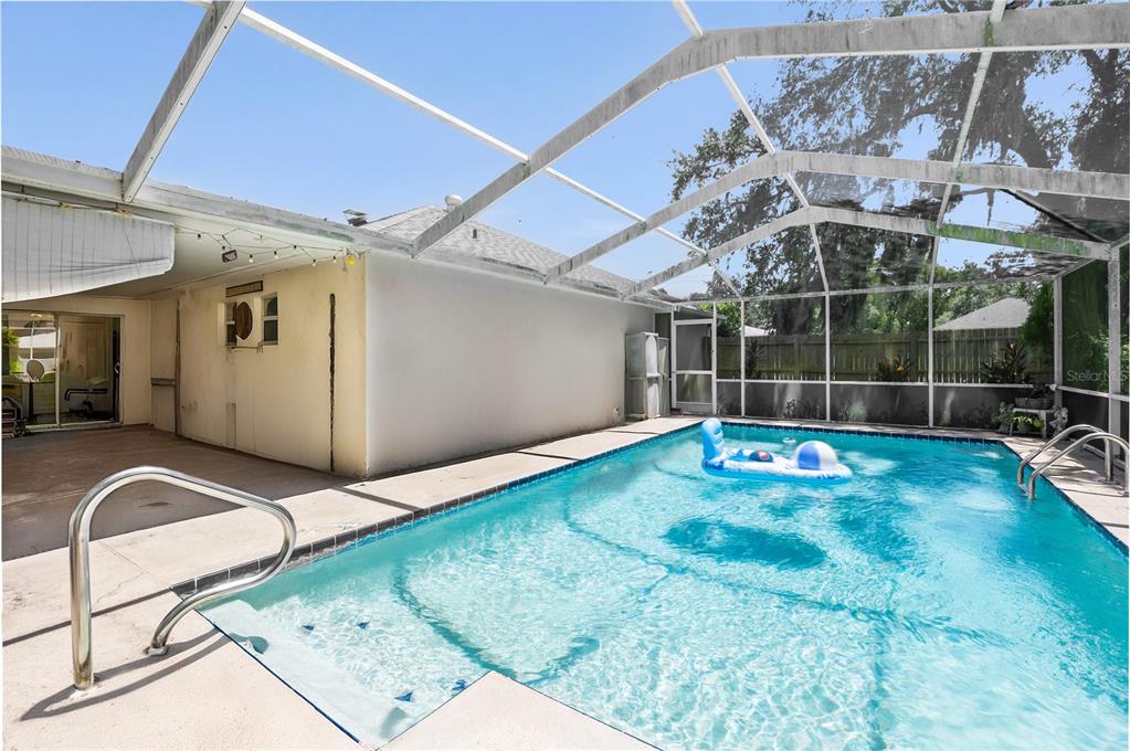 8453 Apple Orchard Road Spring Hill, FL 34608 - Photo 12 of 66 a view of a backyard