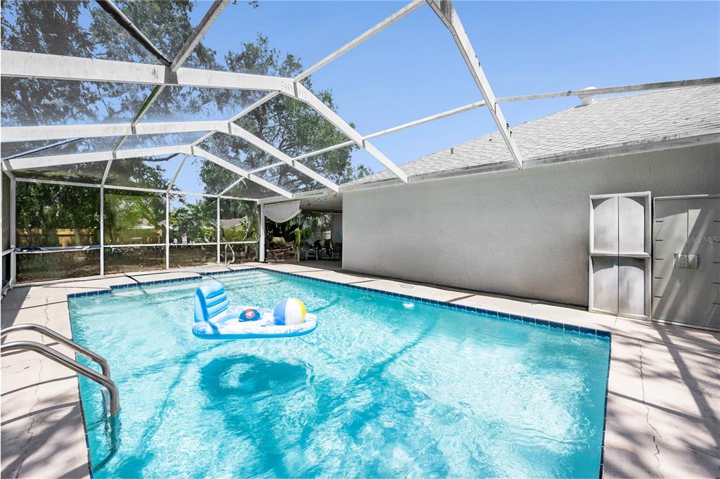 8453 Apple Orchard Road Spring Hill, FL 34608 - Photo 13 of 66 a view of a indoor swimming pool