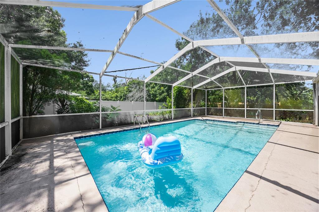 8453 Apple Orchard Road Spring Hill, FL 34608 - Photo 14 of 66 a view of a backyard