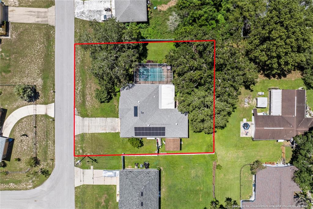 8453 Apple Orchard Road Spring Hill, FL 34608 - Photo 2 of 66 an aerial view of a house