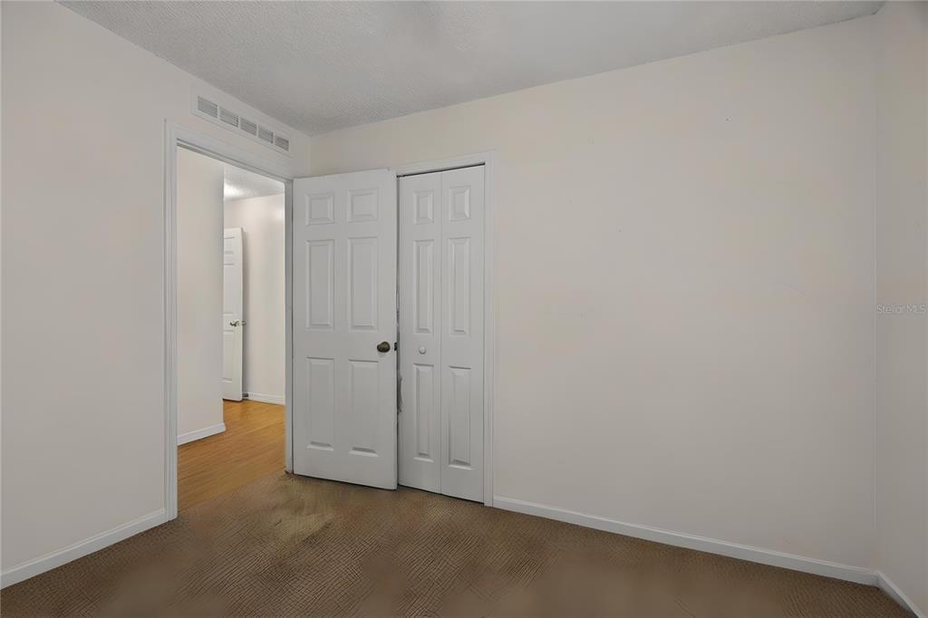 8453 Apple Orchard Road Spring Hill, FL 34608 - Photo 26 of 66 a view of hallway with closet