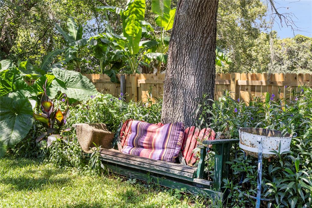 8453 Apple Orchard Road Spring Hill, FL 34608 - Photo 39 of 66 a view of a chairs and table in a patio