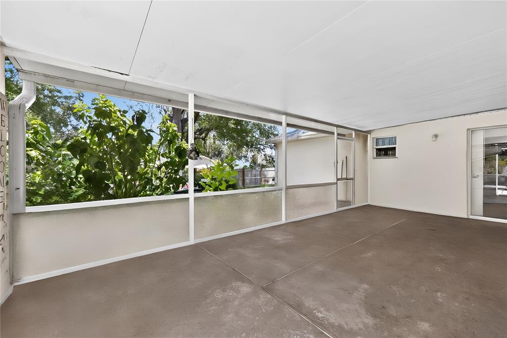 8453 Apple Orchard Road Spring Hill, FL 34608 - Photo 10 of 66 a view of an empty room with a windows