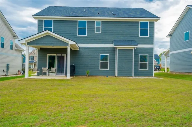 a view of a house with a swimming pool