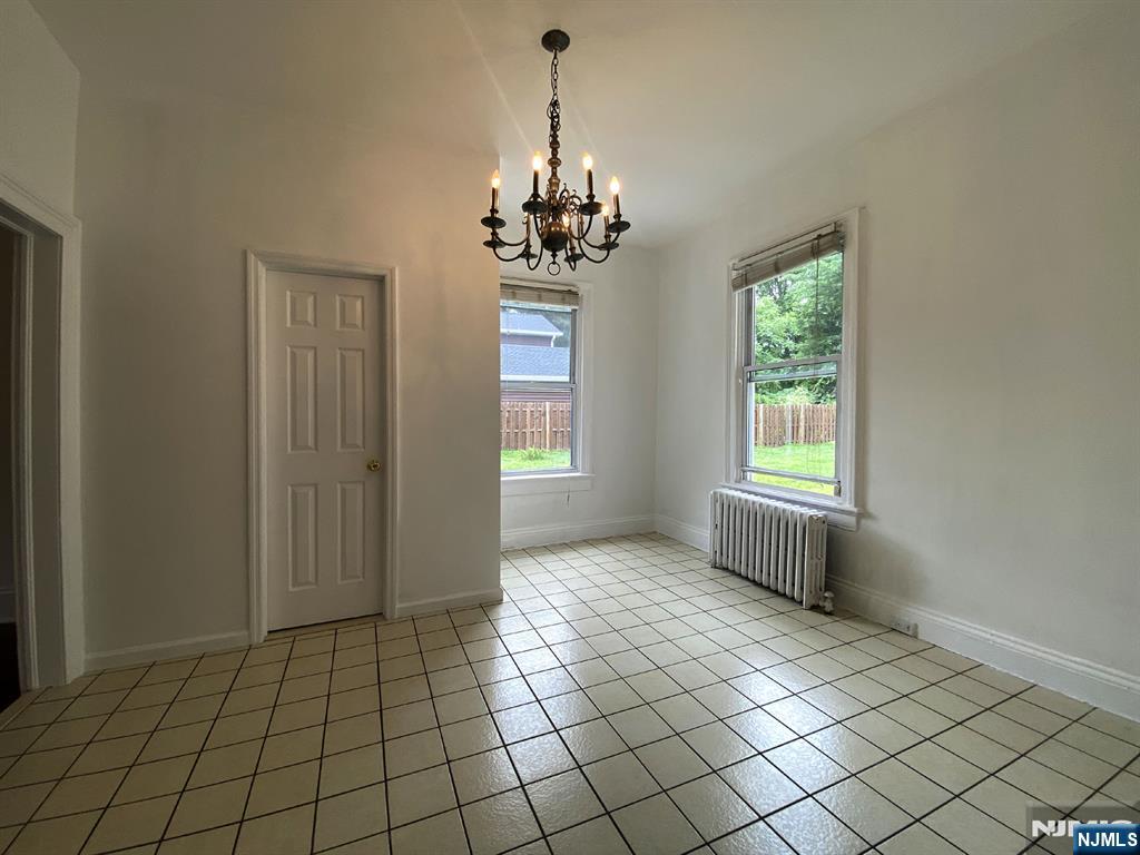 59 Forest Street Alpine, NJ 07620 - Photo 7 of 16 a view of an empty room with window