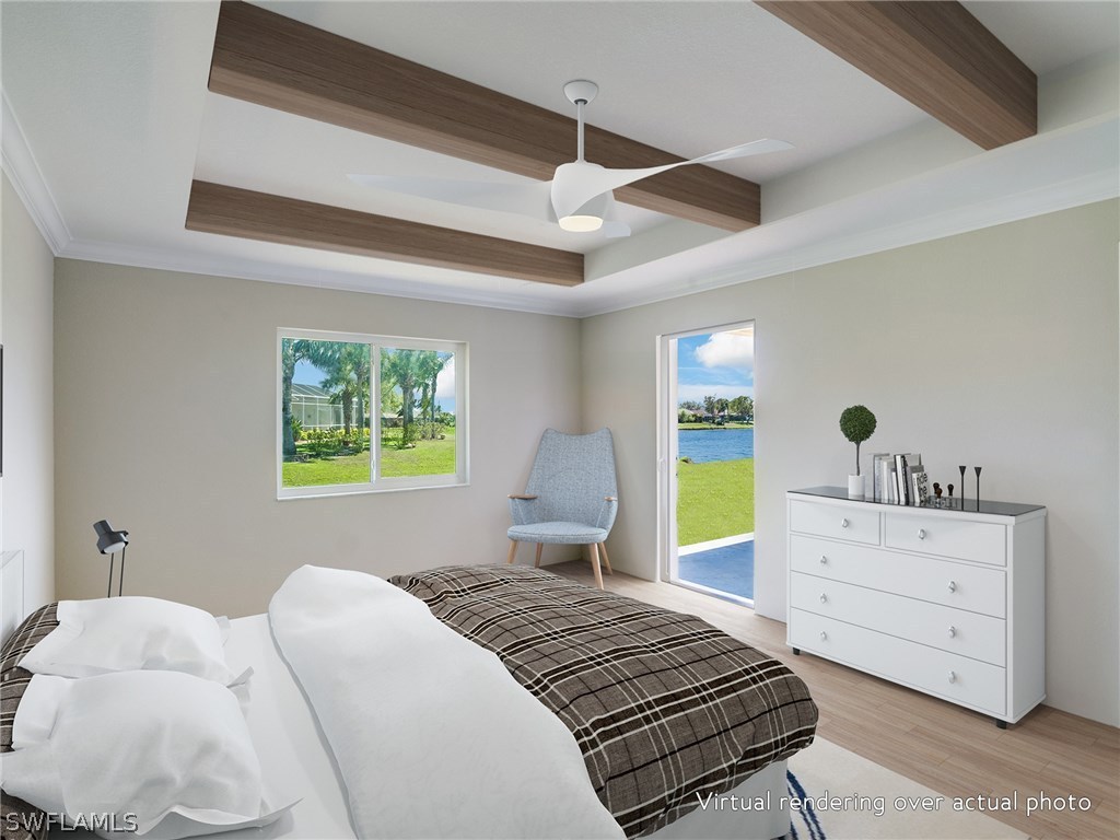 2170 Peterborough Road Punta Gorda, FL 33983 - Photo 8 of 10 a bedroom with a bed and ceiling fan