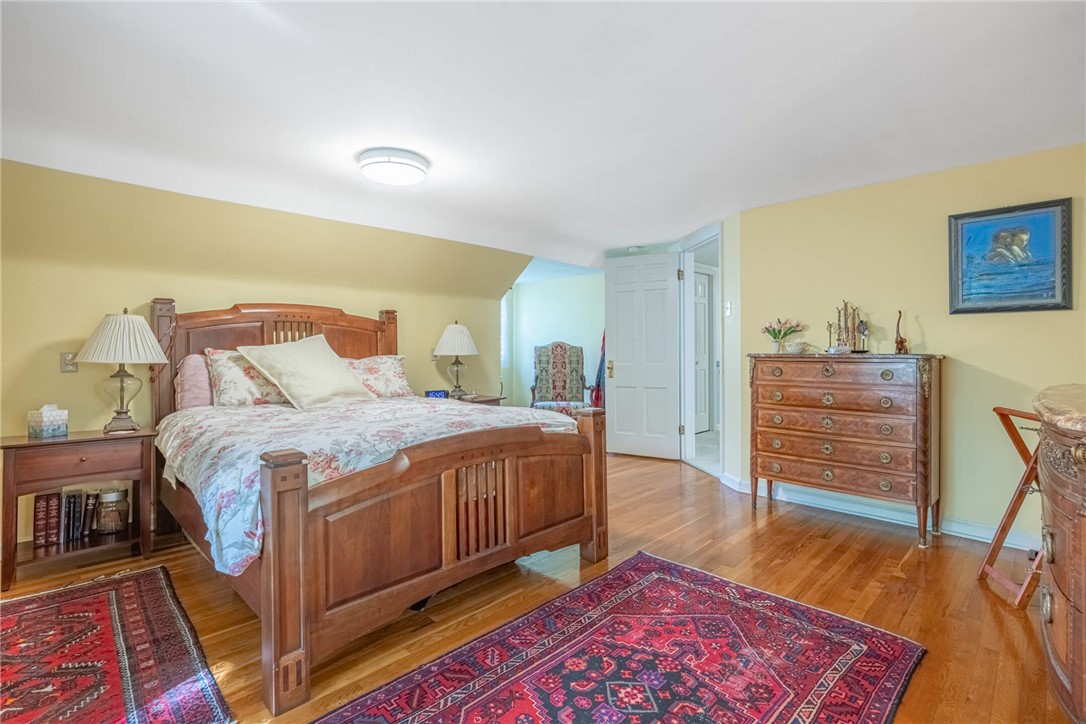 156 West Hadley Road Dayton, OH 45419 - Photo 26 of 71 This spacious bedroom offers gleaming hardwood floors and an inviting atmosphere.