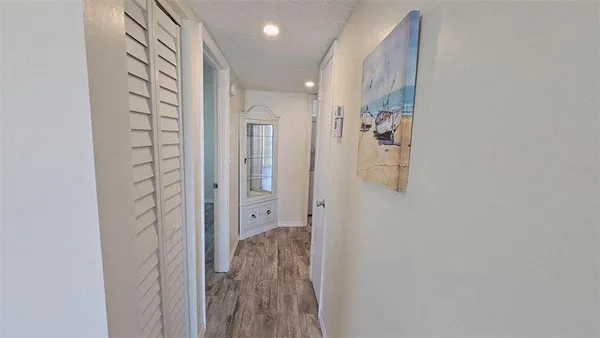 a bathroom with a shower and a sink