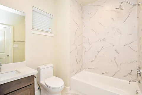 an empty room with closet area