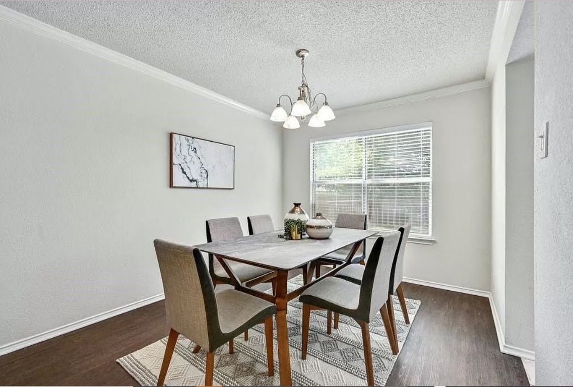 2008 Heather Drive Cedar Park, TX 78613 - Photo 4 of 8 a view of a dining room with furniture window and wooden floor
