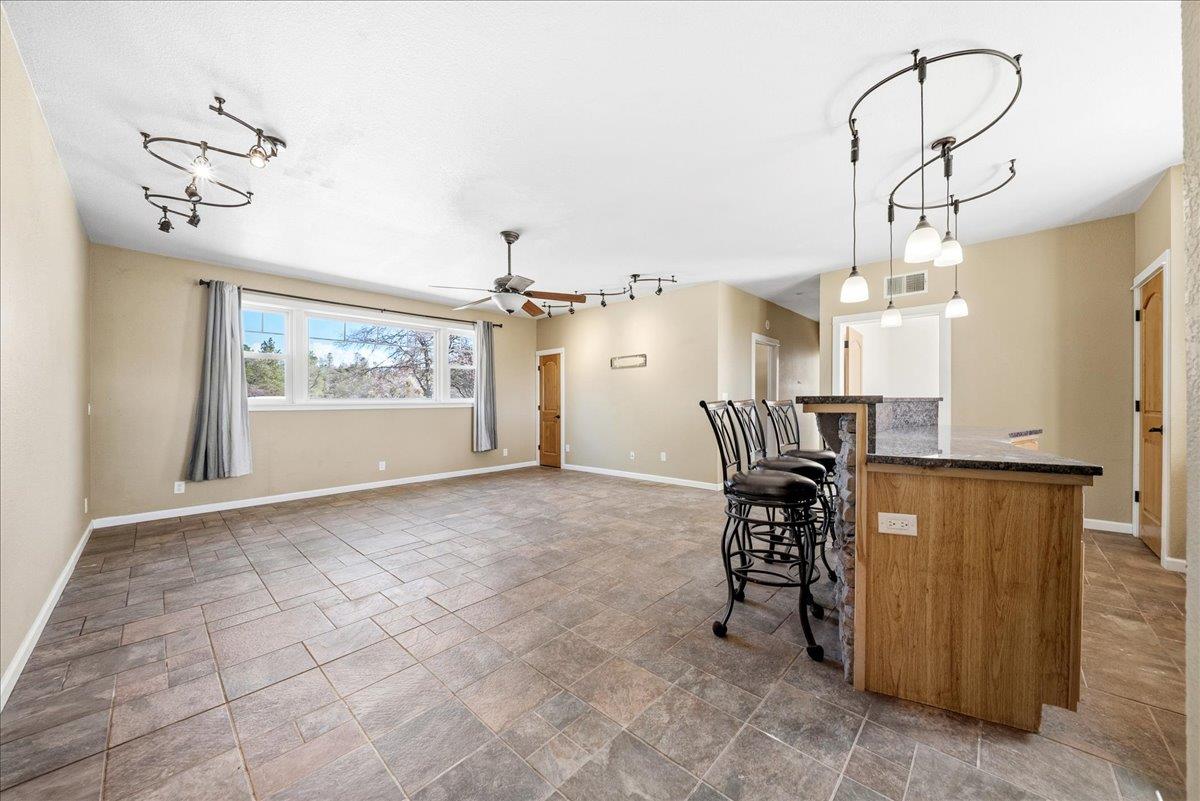 16035 Running Springs Road Grass Valley, CA 95949 - Photo 37 of 94 a view of a livingroom with furniture and a chandelier