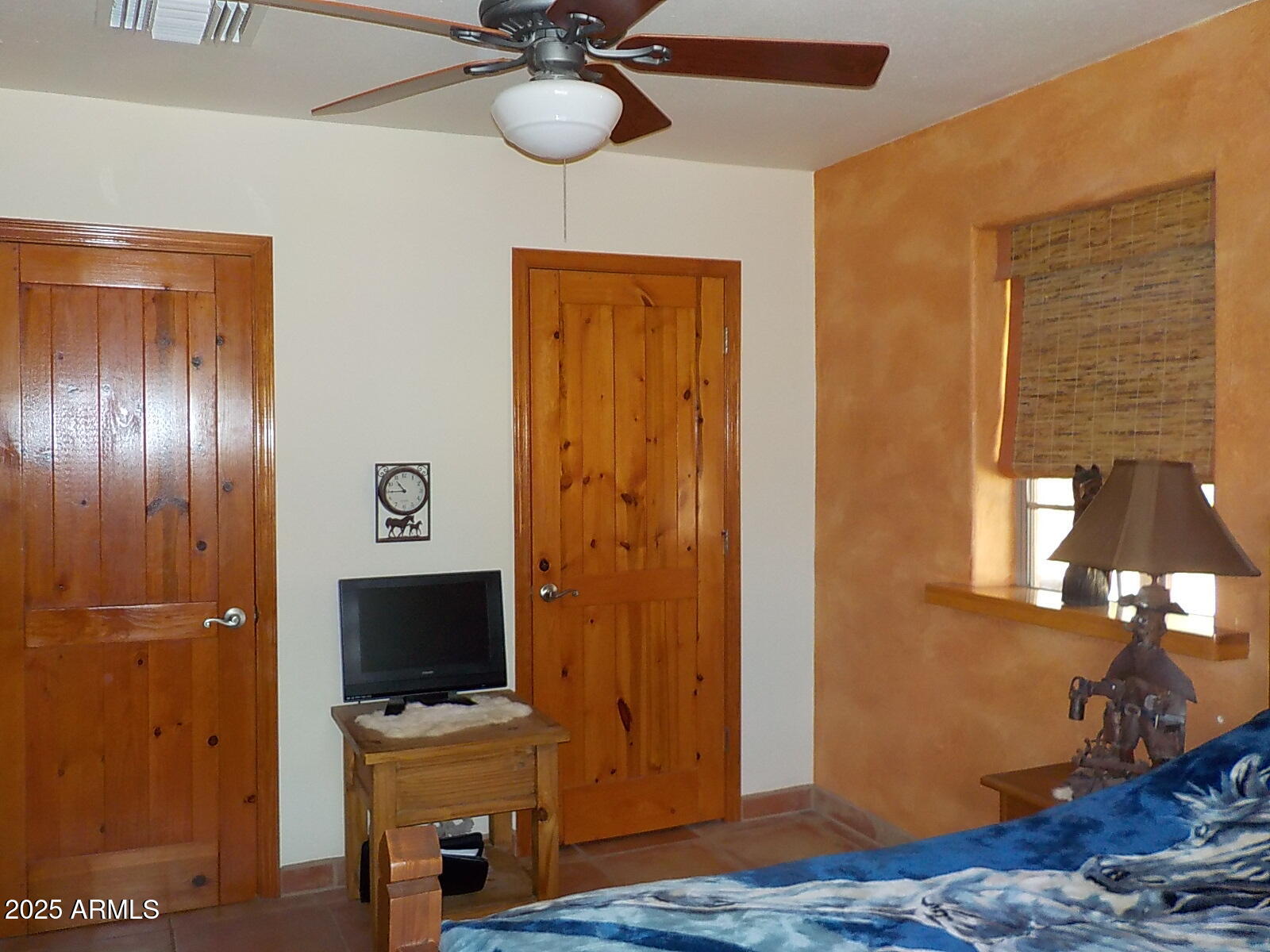 10023 North Bell Road Elfrida, AZ 85610 - Photo 16 of 51 a view of a livingroom with a flat screen tv