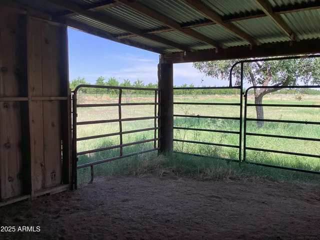 a room with lots of furniture and clutter