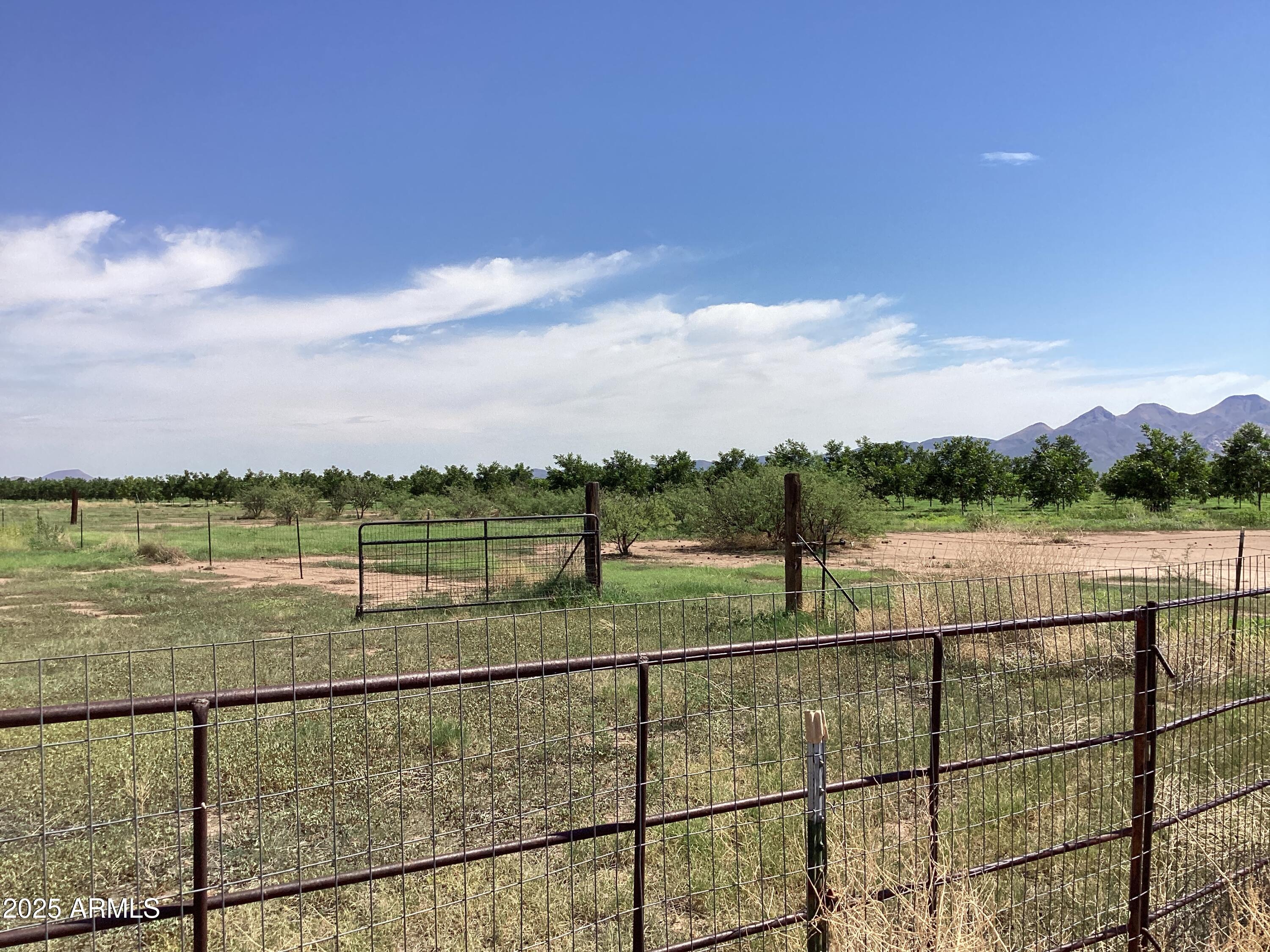 10023 North Bell Road Elfrida, AZ 85610 - Photo 34 of 51 a view of a lake from a balcony