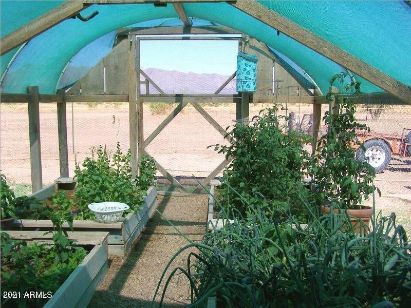 10023 North Bell Road Elfrida, AZ 85610 - Photo 44 of 51 a patio with table and chairs and potted plants
