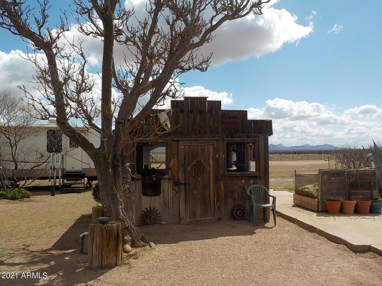 10023 North Bell Road Elfrida, AZ 85610 - Photo 48 of 51 a view of a car park in front of house