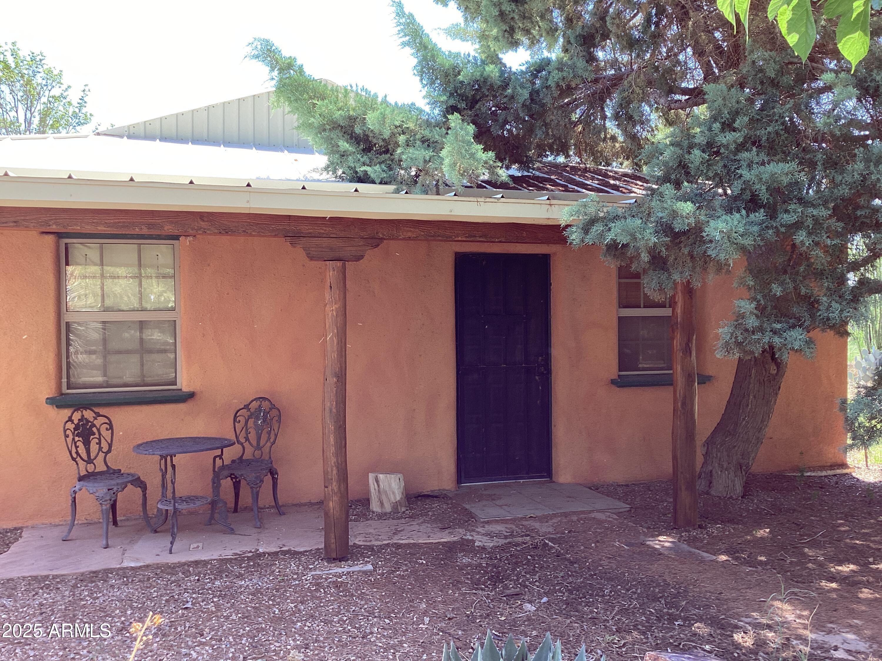 10023 North Bell Road Elfrida, AZ 85610 - Photo 50 of 51 a view of a chairs and table in the patio