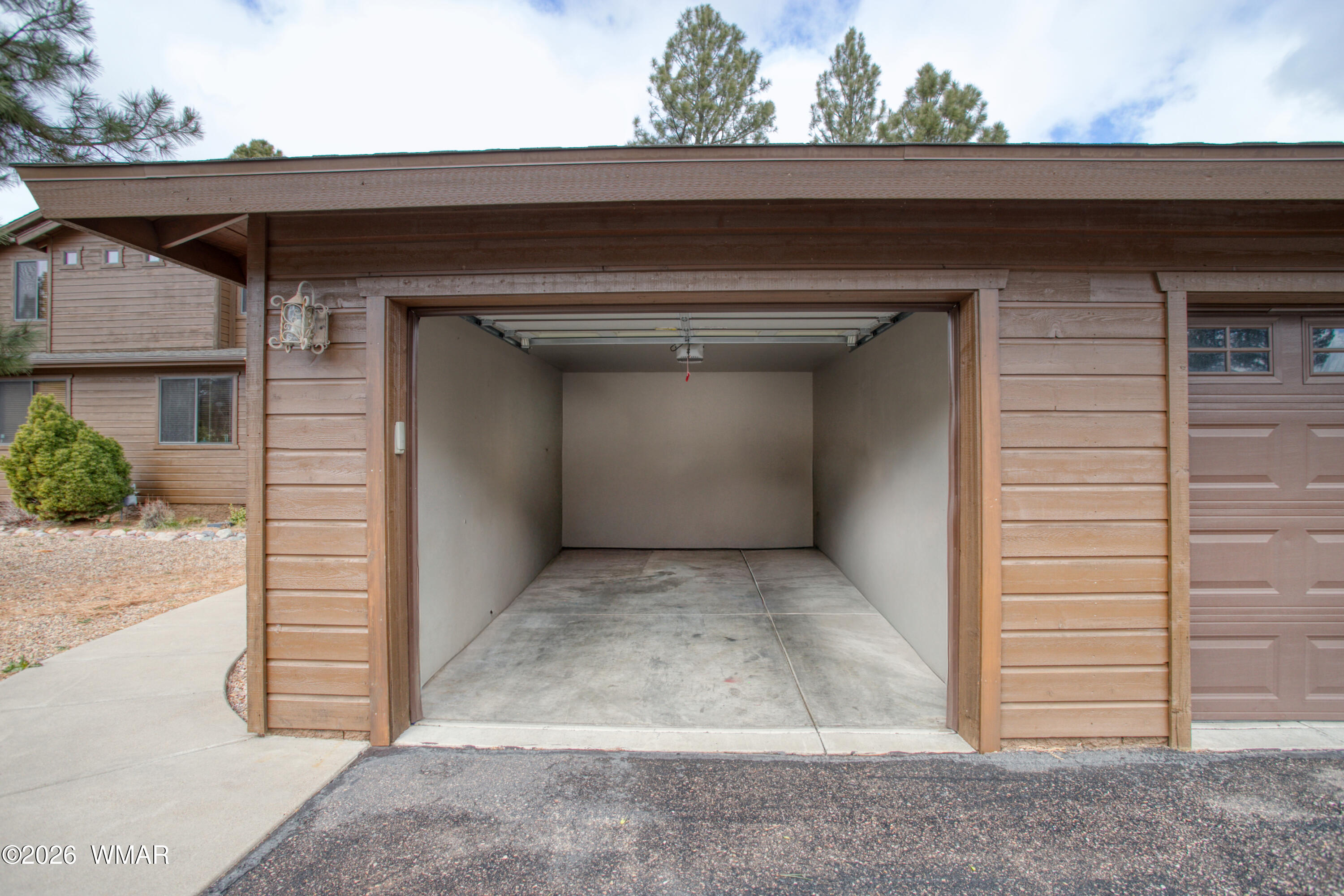 2970 West Villa Loop Show Low, AZ 85901 - Photo 32 of 50 Garage Inside