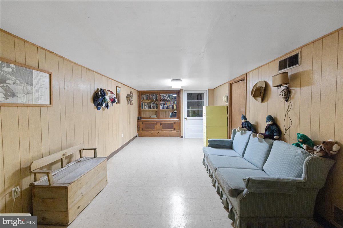 1714 Moyers Road Hatfield, PA 19440 - Photo 22 of 31 a living room with furniture and a wooden floor