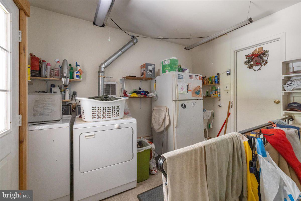 1714 Moyers Road Hatfield, PA 19440 - Photo 23 of 31 a storage room with washer and dryer